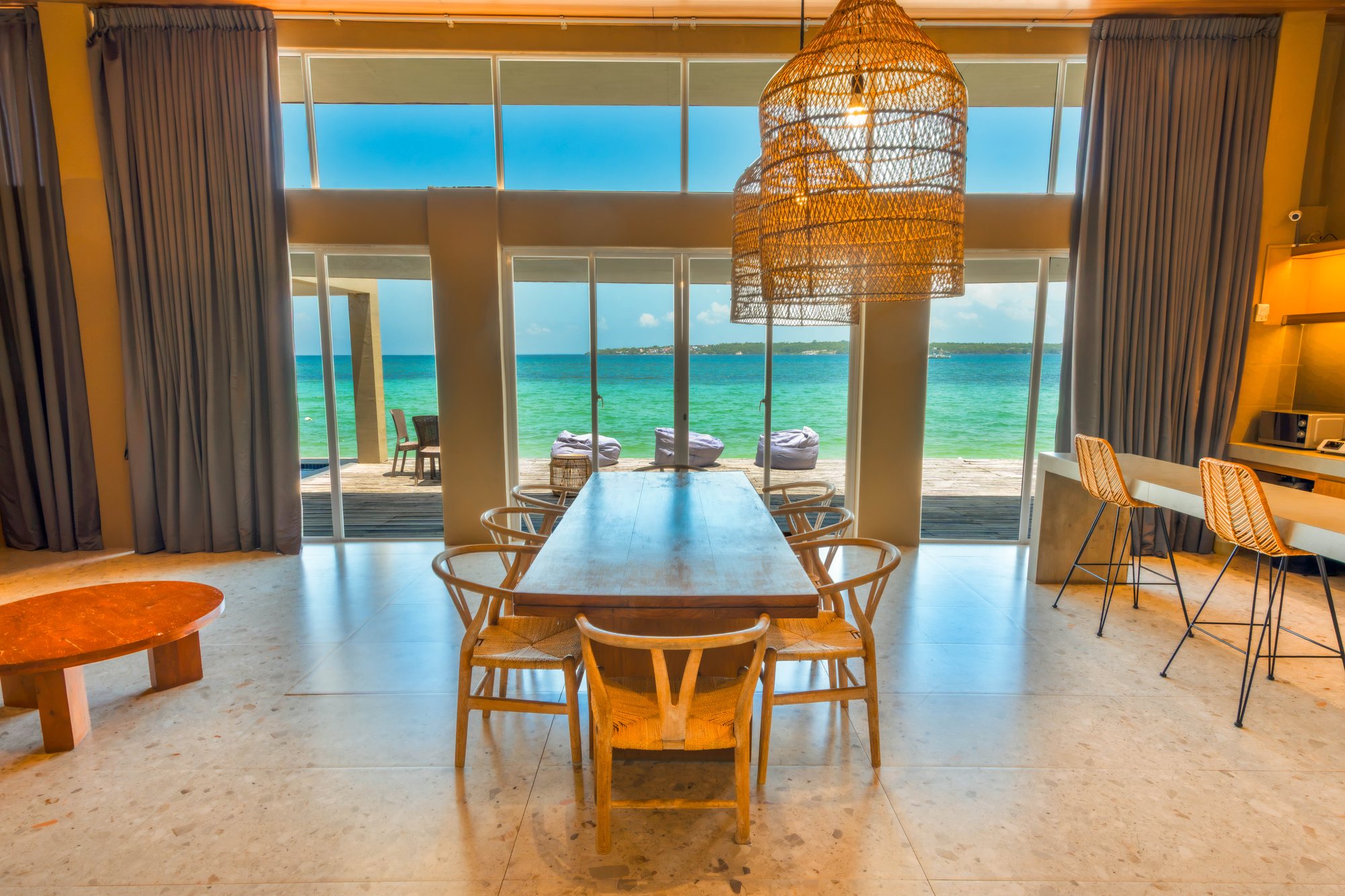 Costa Medellin dining area with beachfront ocean view