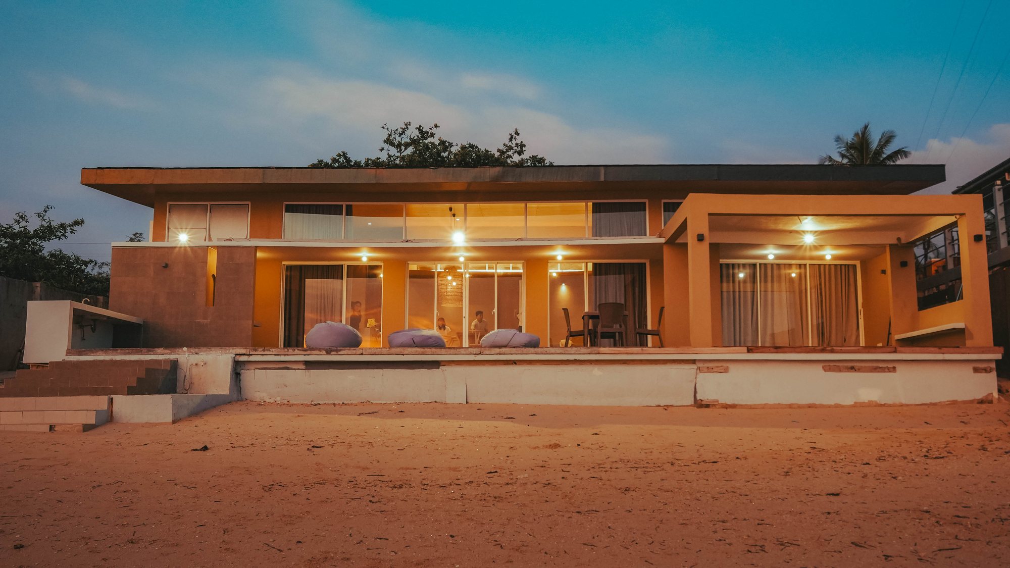 Costa Medellin villa exterior at night