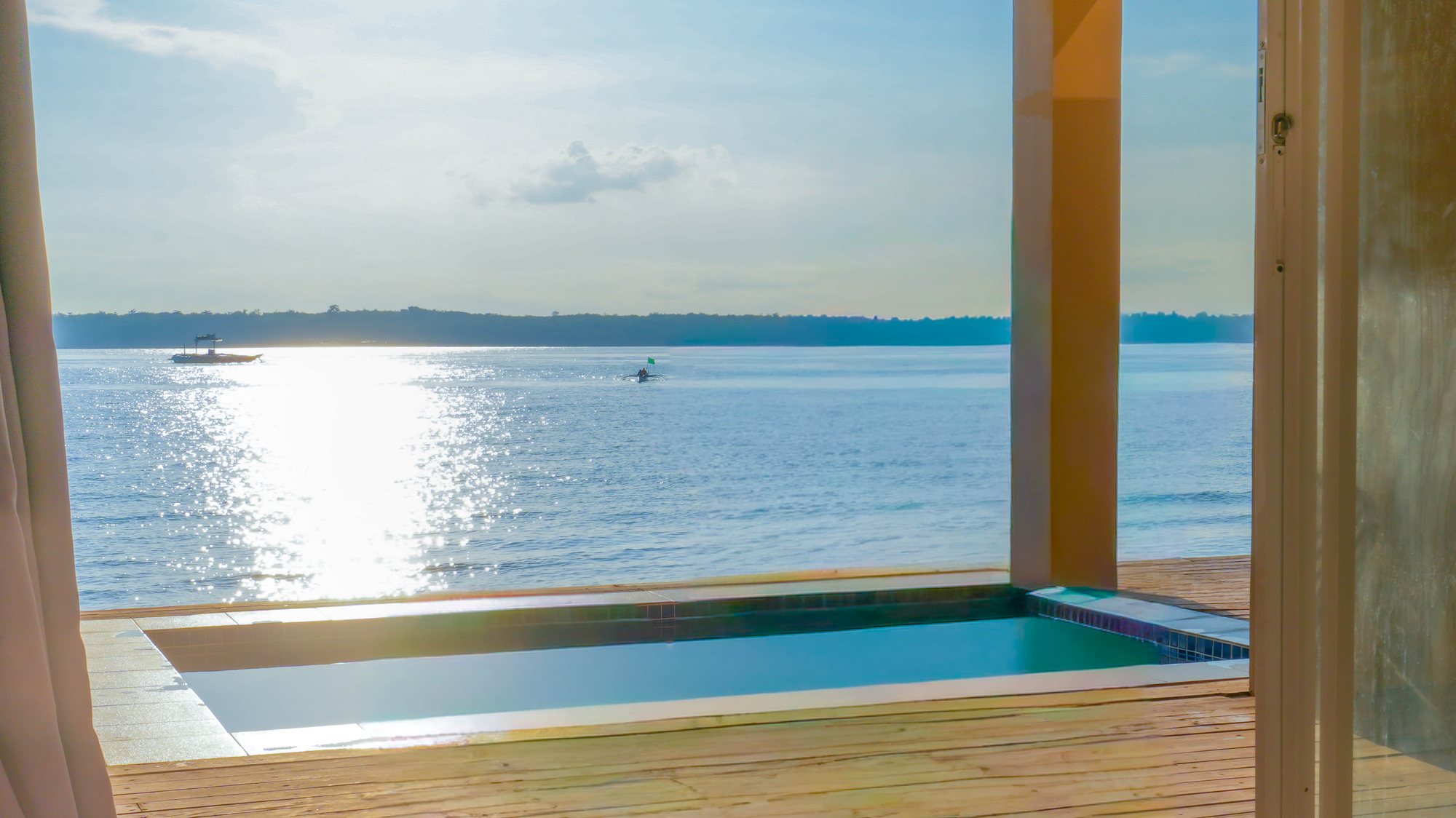 Costa Medellin plunge pool overlooking the ocean at sunset