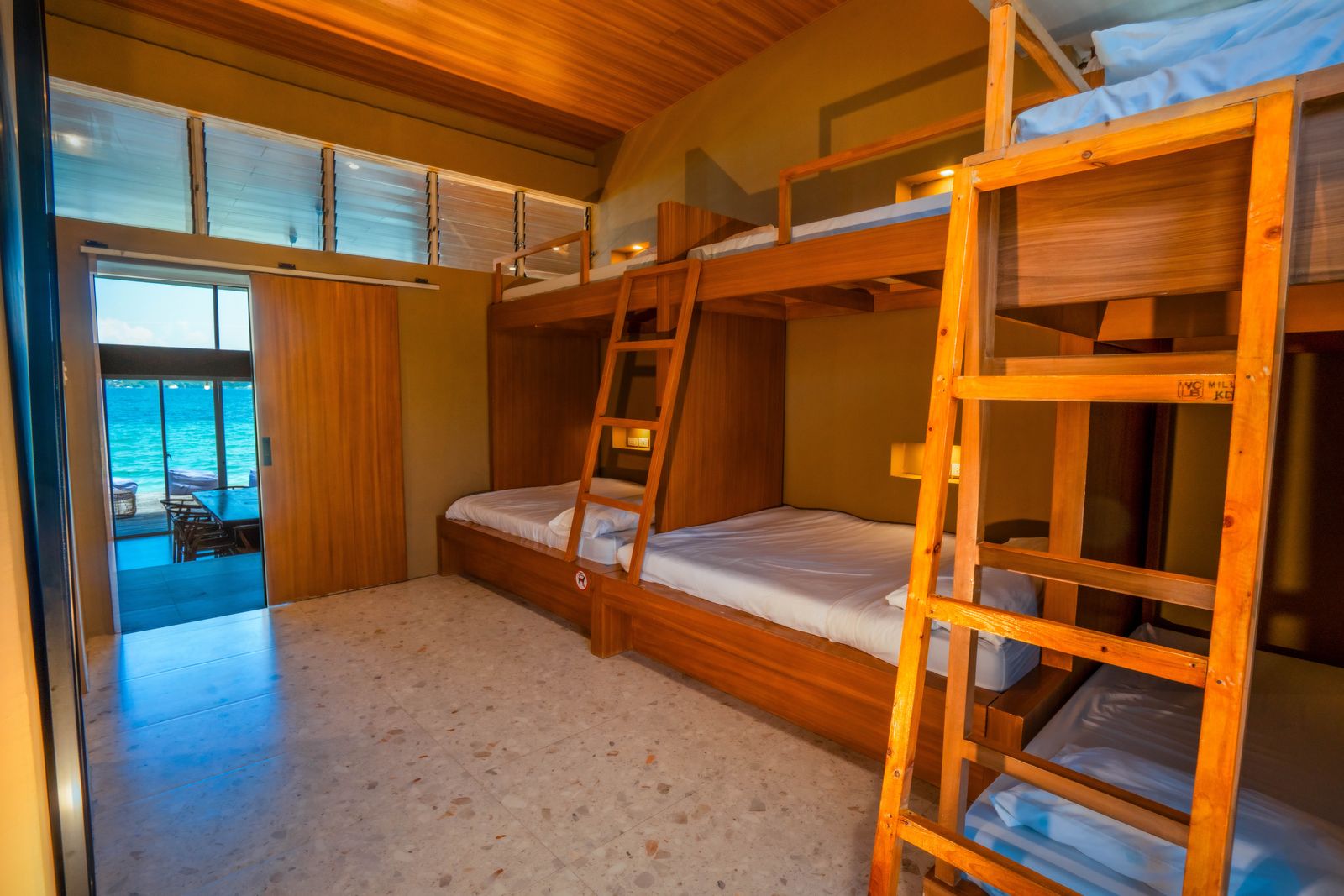 Bunk Room bedroom with water-view doorway